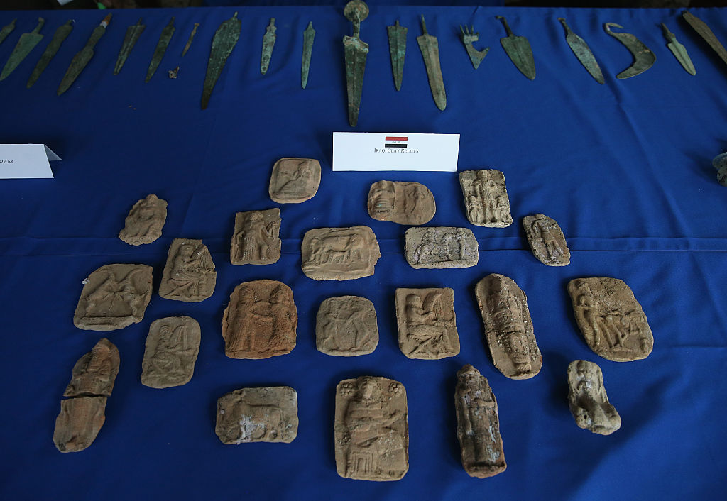 WASHINGTON, DC - MARCH 16:  Ancient Iraqi clay reliefs and knives are on display during a ceremony to repatriate Iraqi cultural items that were smuggled into the United States, March 16, 2015 in Washington, DC.  More than 60 cultural treasures were returned to the Republic of Iraq following investigations by the US Immigration and Customs Enforcement and the Department of Homeland Security .  (Photo by Mark Wilson/Getty Images)